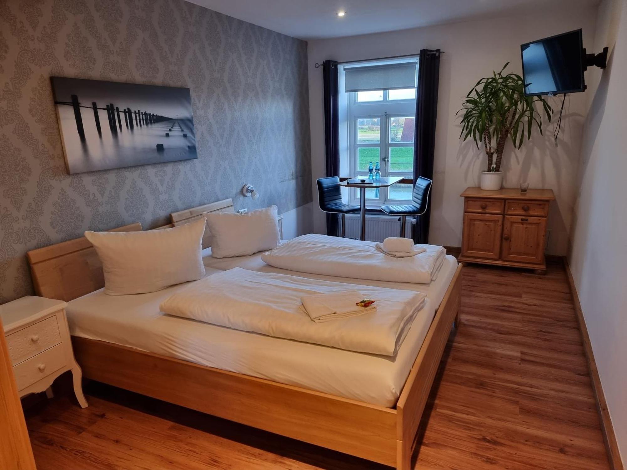 Hotel Packhaus Hooksiel Rom bilde